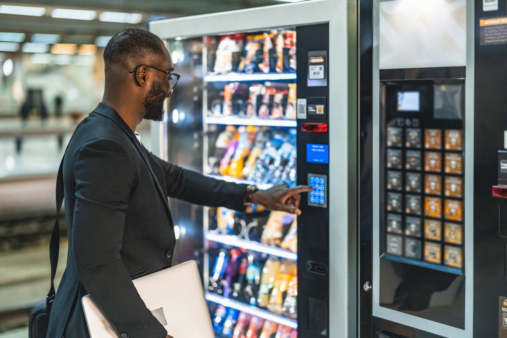 business people using vending machine